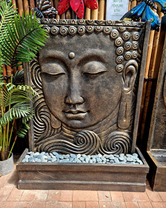 Buddha face water feature