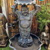 black laughing Buddha water feature